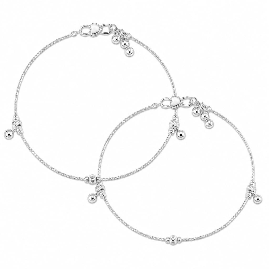 Pair of 925 sterling silver ball station kids anklets on white background