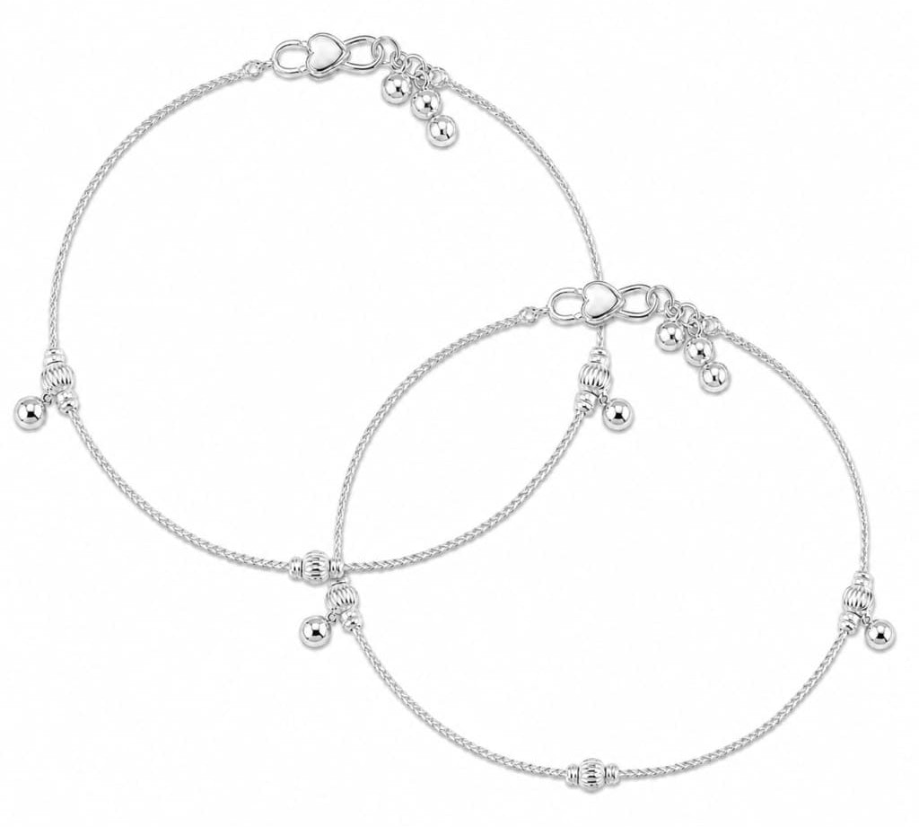 Pair of 925 sterling silver ball station kids anklets on white background