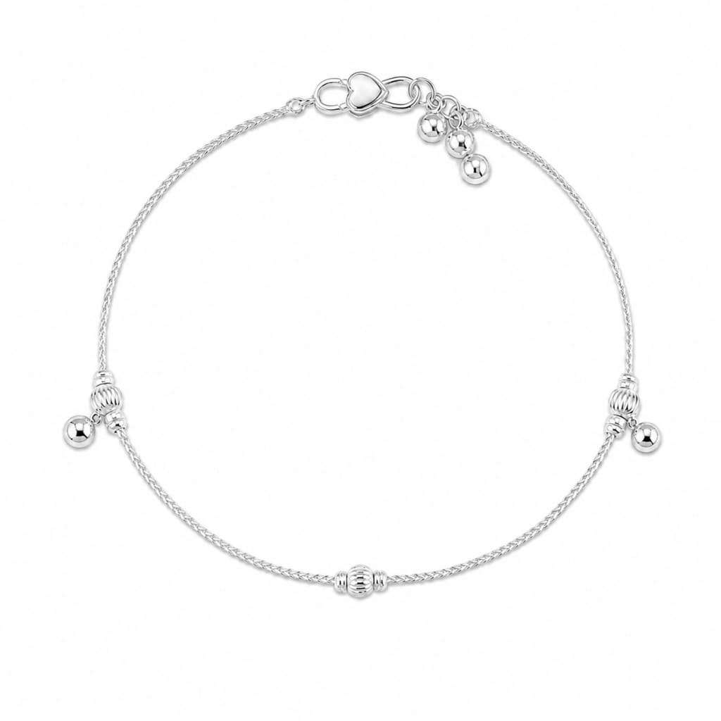 Single 925 sterling silver ball station kids anklet on white background
