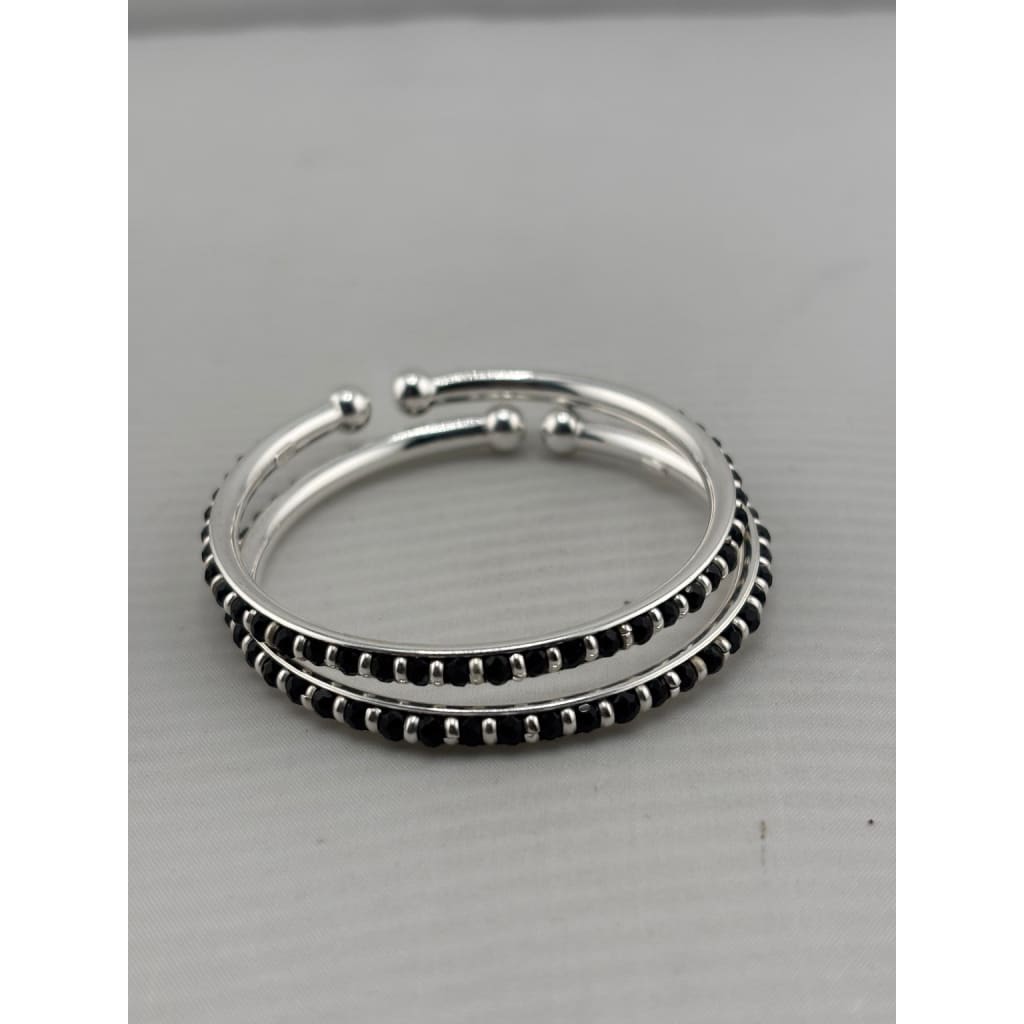 Original view of silver kids bangle pair with black stones