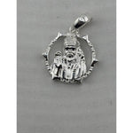Close-up of the circular Sai Baba sterling silver pendant