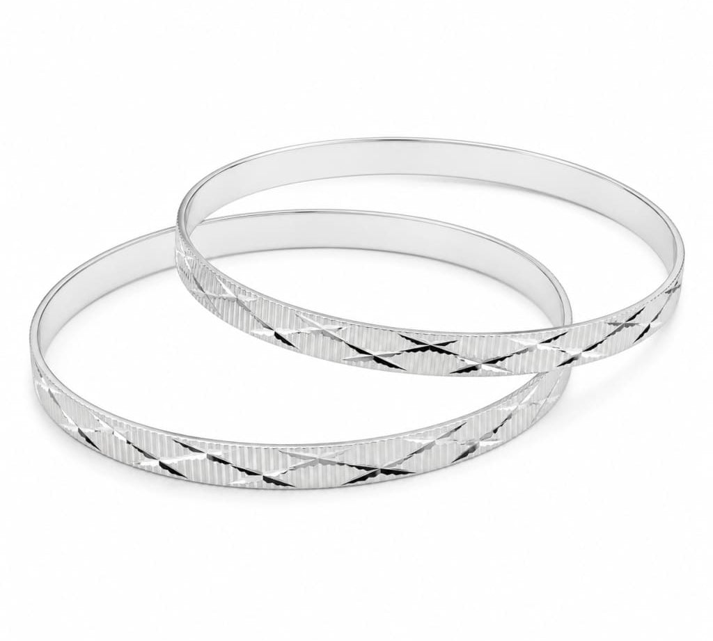 Pair of 925 sterling silver diamond-cut bangle bracelets, 57 mm