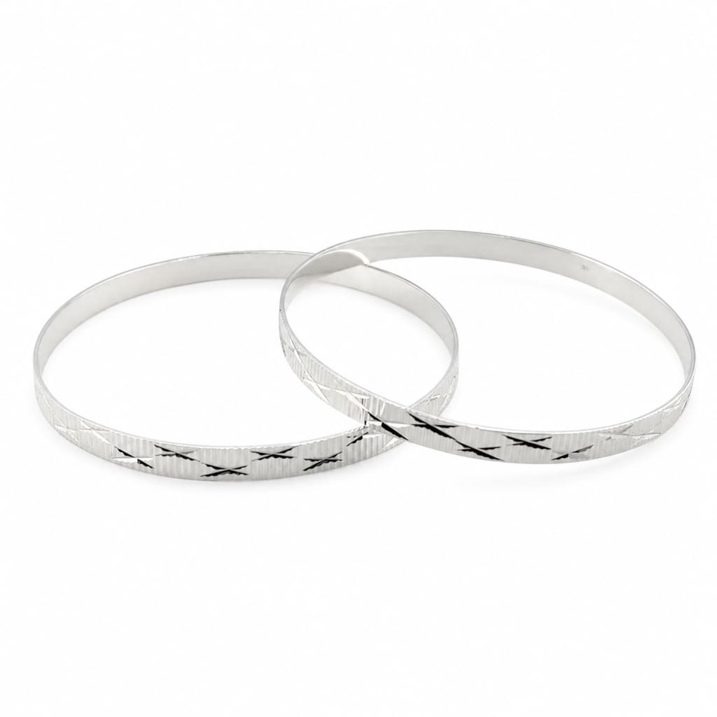 Pair of 925 sterling silver diamond-cut bangle bracelets, 60 mm