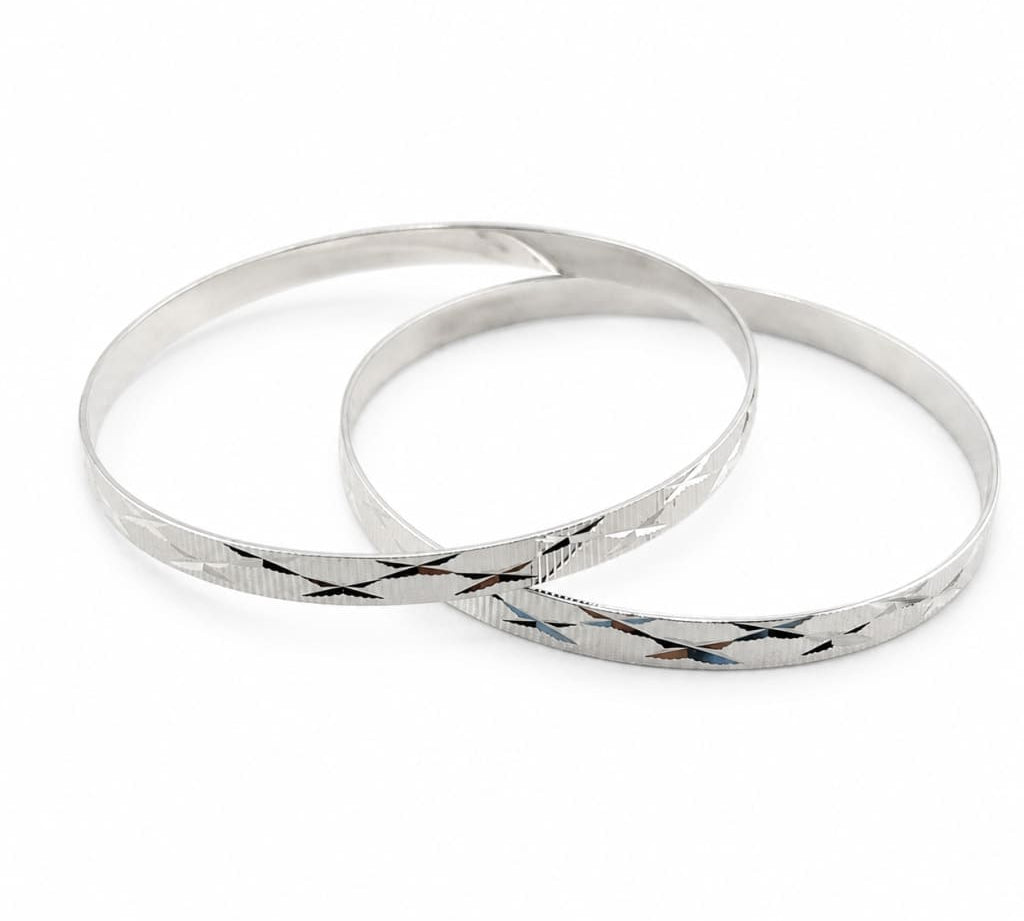 Pair of 925 sterling silver diamond-cut bangle bracelets, 63 mm