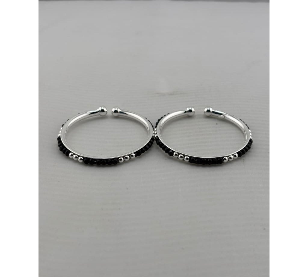 925 sterling silver kids bangle pair front view showing black bead pattern and silver accents