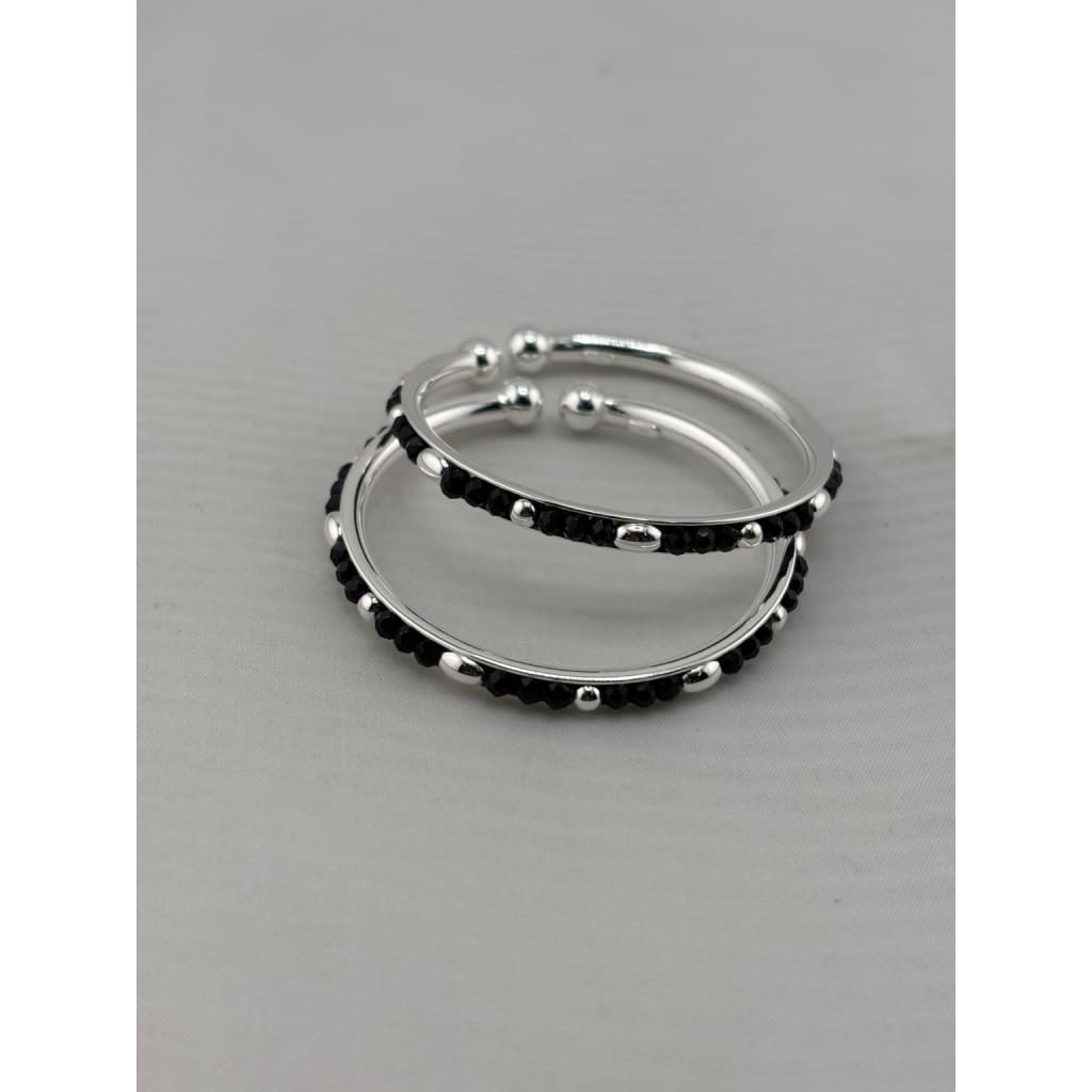 925 sterling silver kids bangle pair stacked view showing black bead and silver accent design
