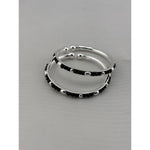925 sterling silver kids bangle pair stacked view showing black bead and silver accent design