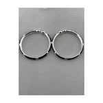 925 sterling silver kids bangle pair with black bead accents on pure white background