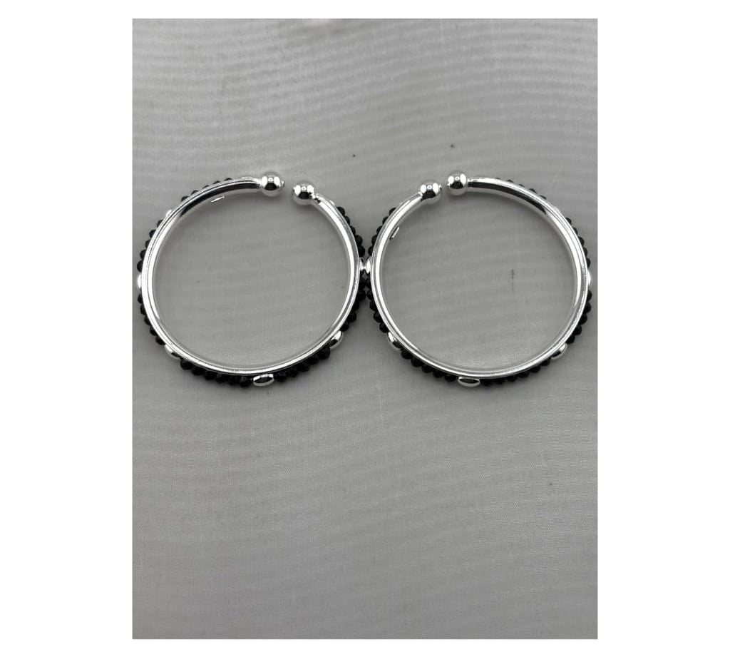 925 sterling silver kids bangle pair with black bead accents on pure white background