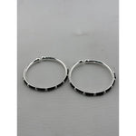 Original photo of silver kids black bead bangle pair