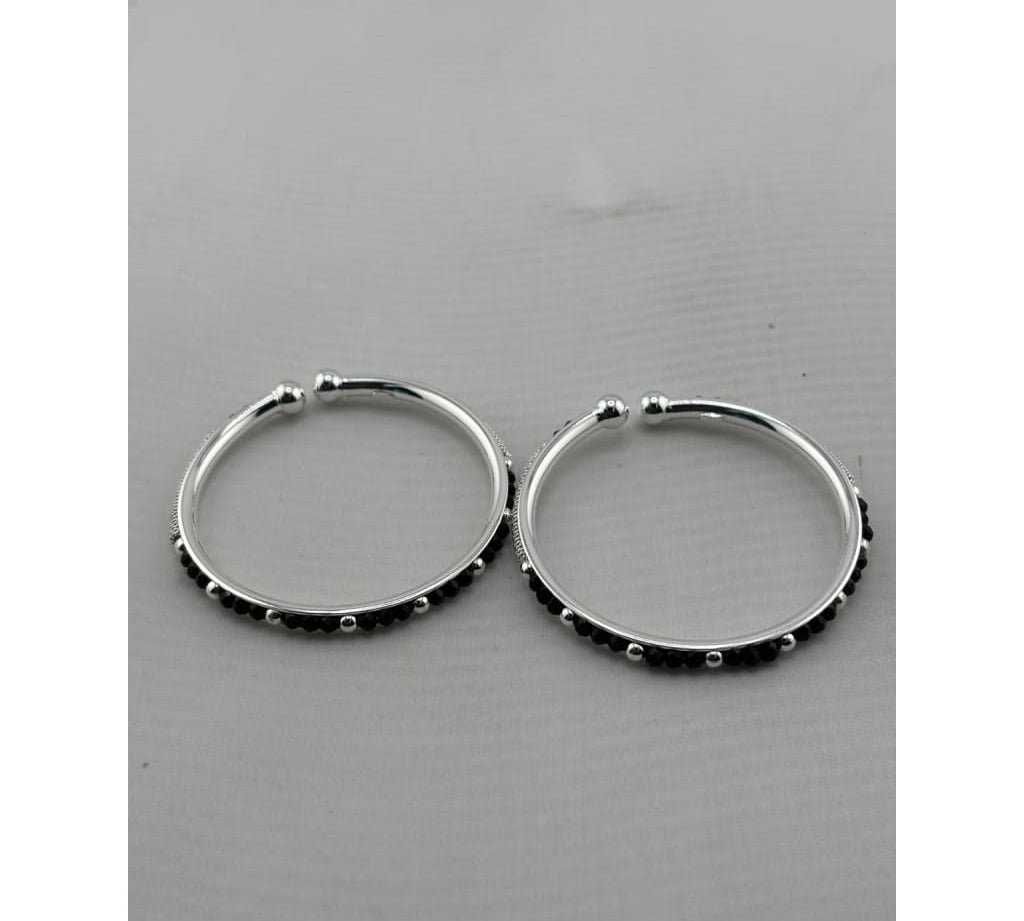 Original photo of silver kids black bead bangle pair