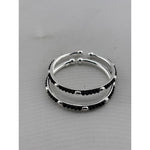 Kids silver bangle pair angled view