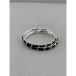 Kids silver bangle pair angled view