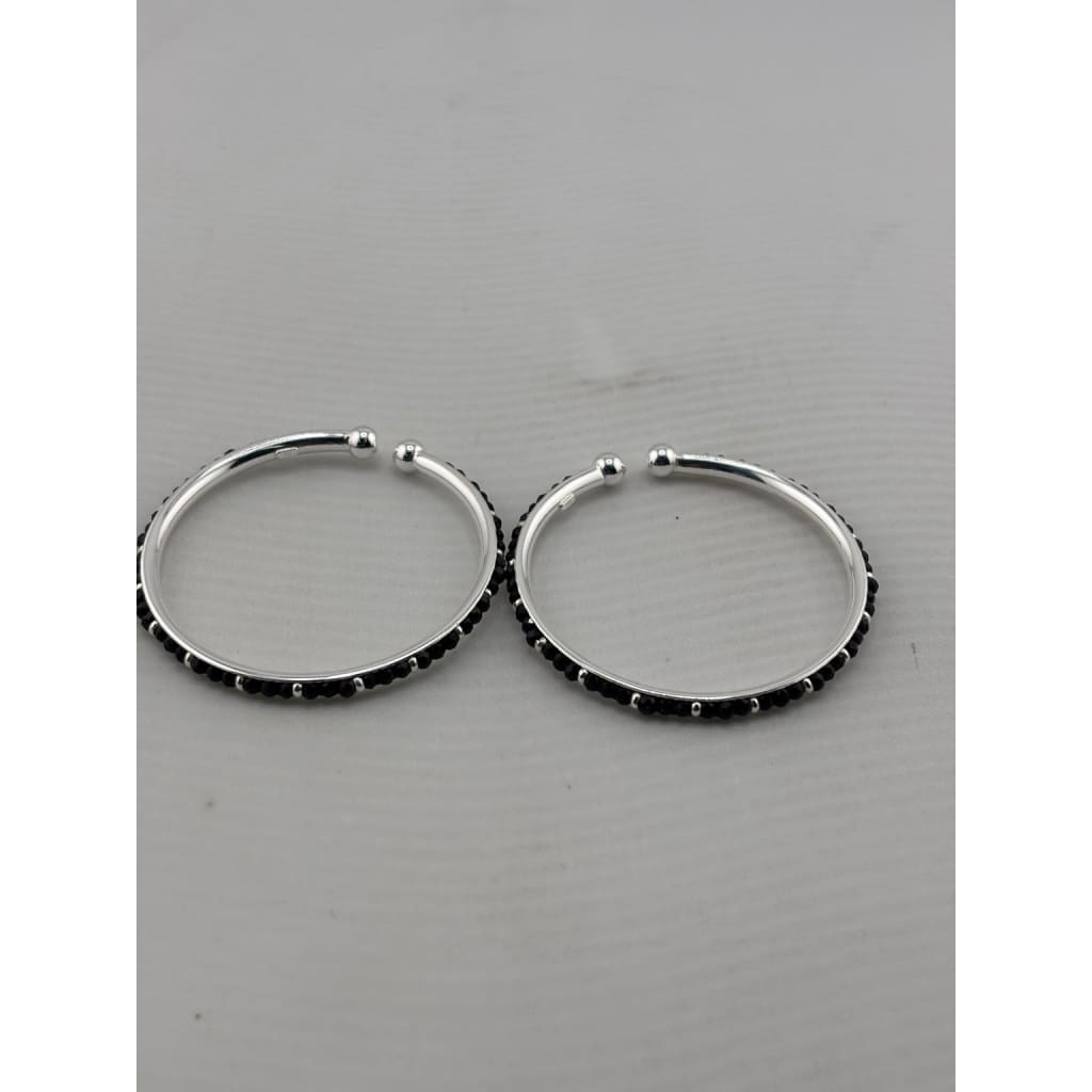 Silver baby bangle pair angled view
