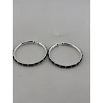 Silver baby bangle pair angled view