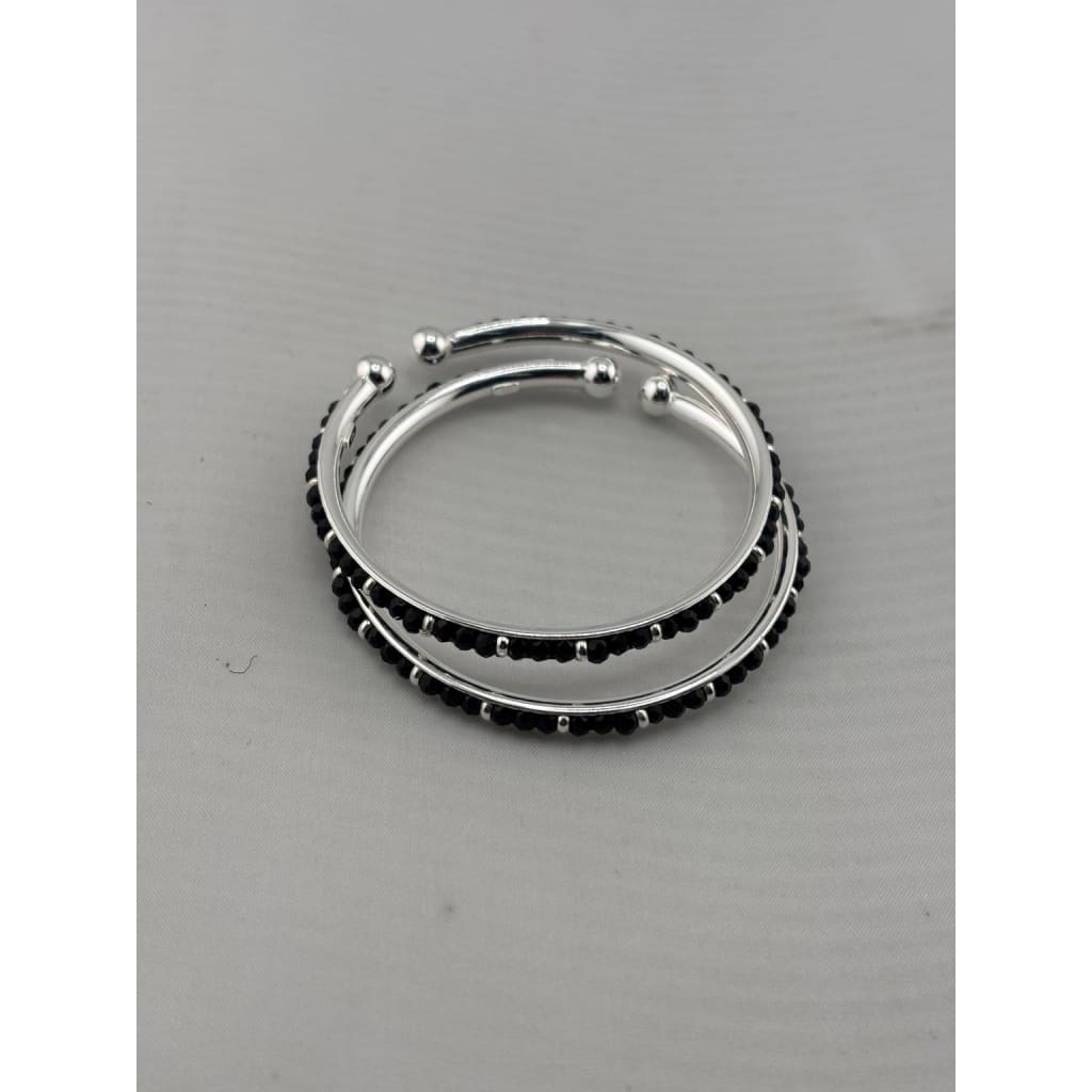 Silver baby bangles with black stones stacked view