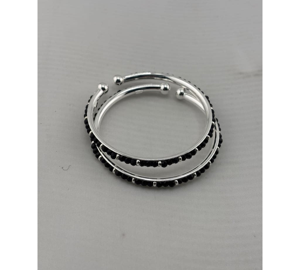 Silver baby bangles with black stones stacked view