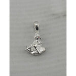 925 sterling silver seated Krishna pendant depicting the deity playing a flute