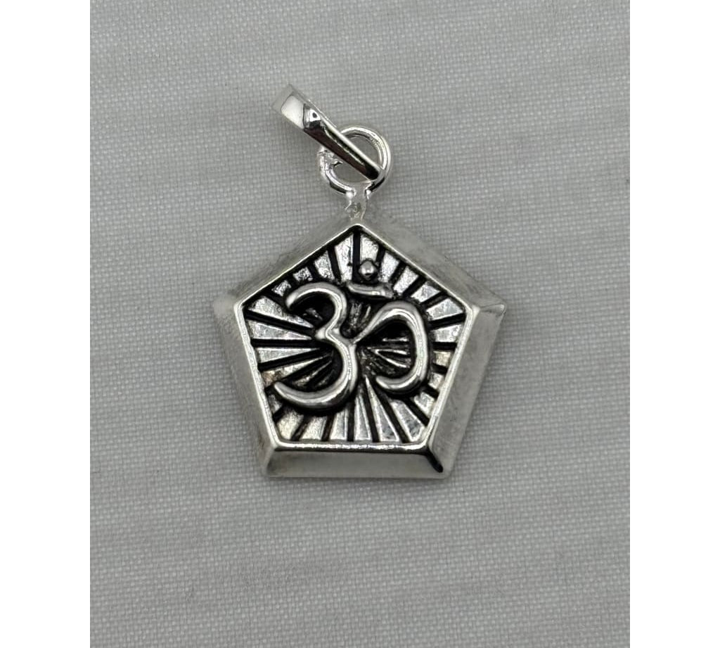 Original close-up of an oxidised silver Om pendant with pentagonal frame