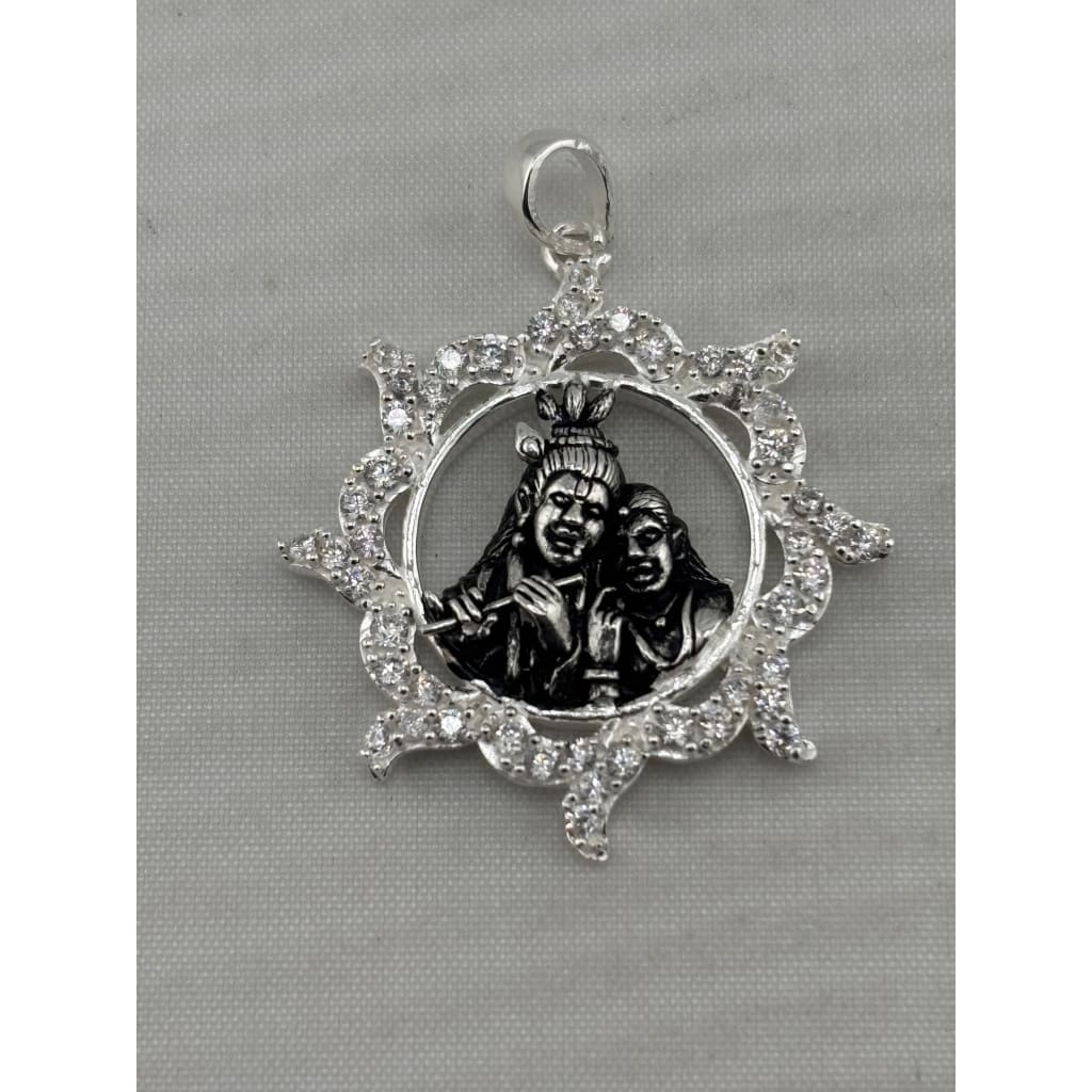 925 sterling silver Radha Krishna flute pendant with oxidised portrait and clear crystal floral frame