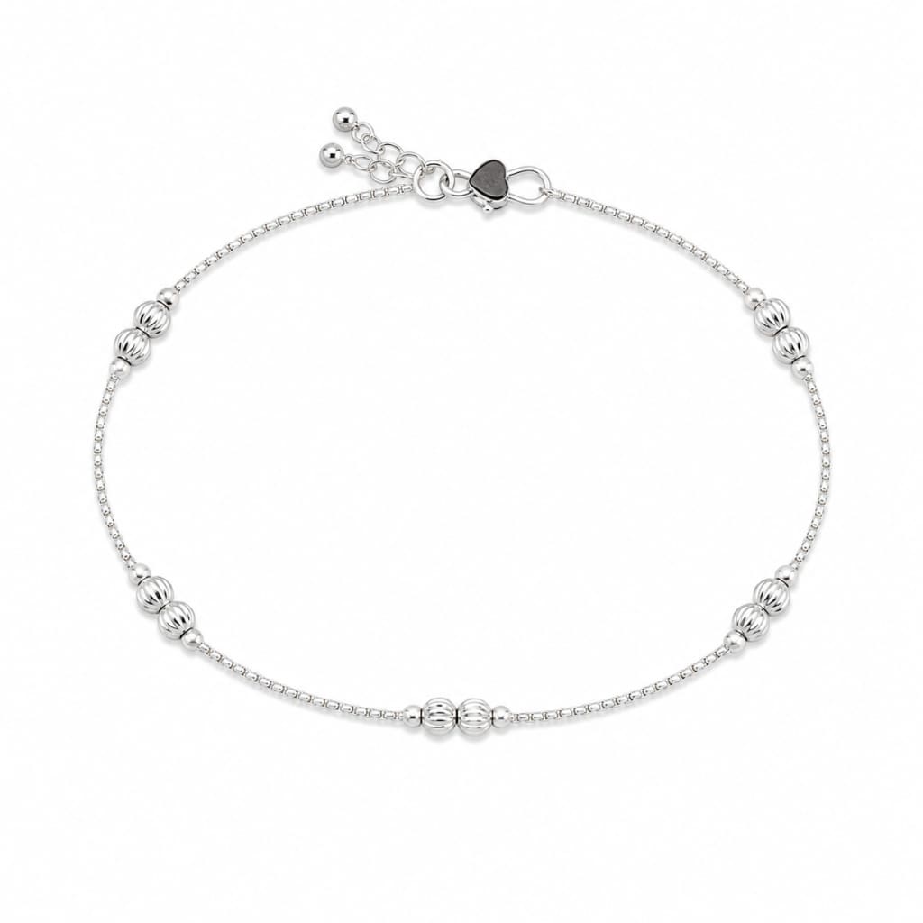 Single 925 sterling silver ribbed bead kids anklet on white background
