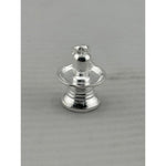 Original close-up of a polished silver Shiva lingam pendant