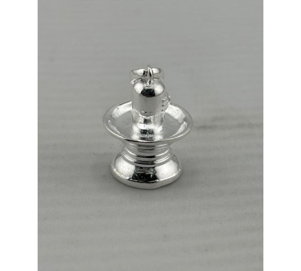 Original close-up of a polished silver Shiva lingam pendant