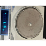 Standing elephant pendant on a digital scale showing a weight of 5.18 grams