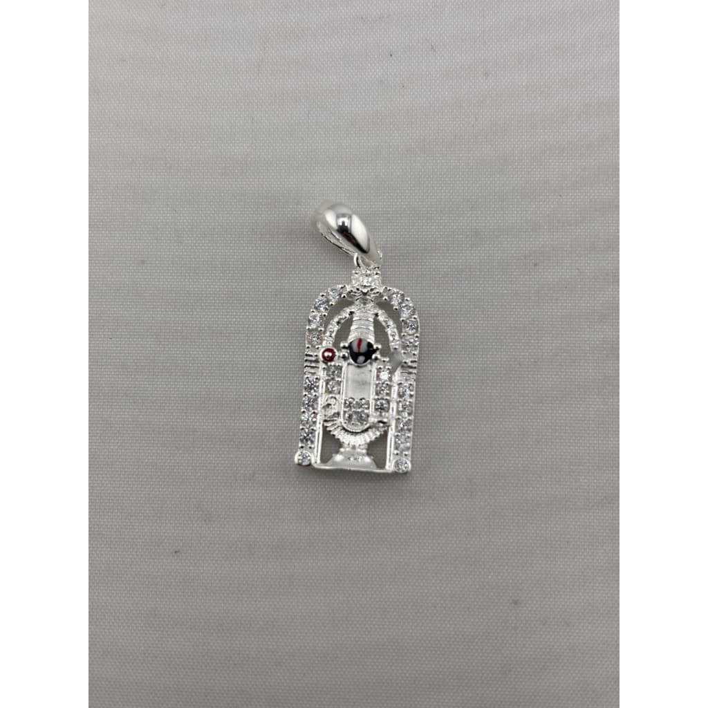 Front view of a silver-tone Tirupati Balaji temple pendant with clear stone accents