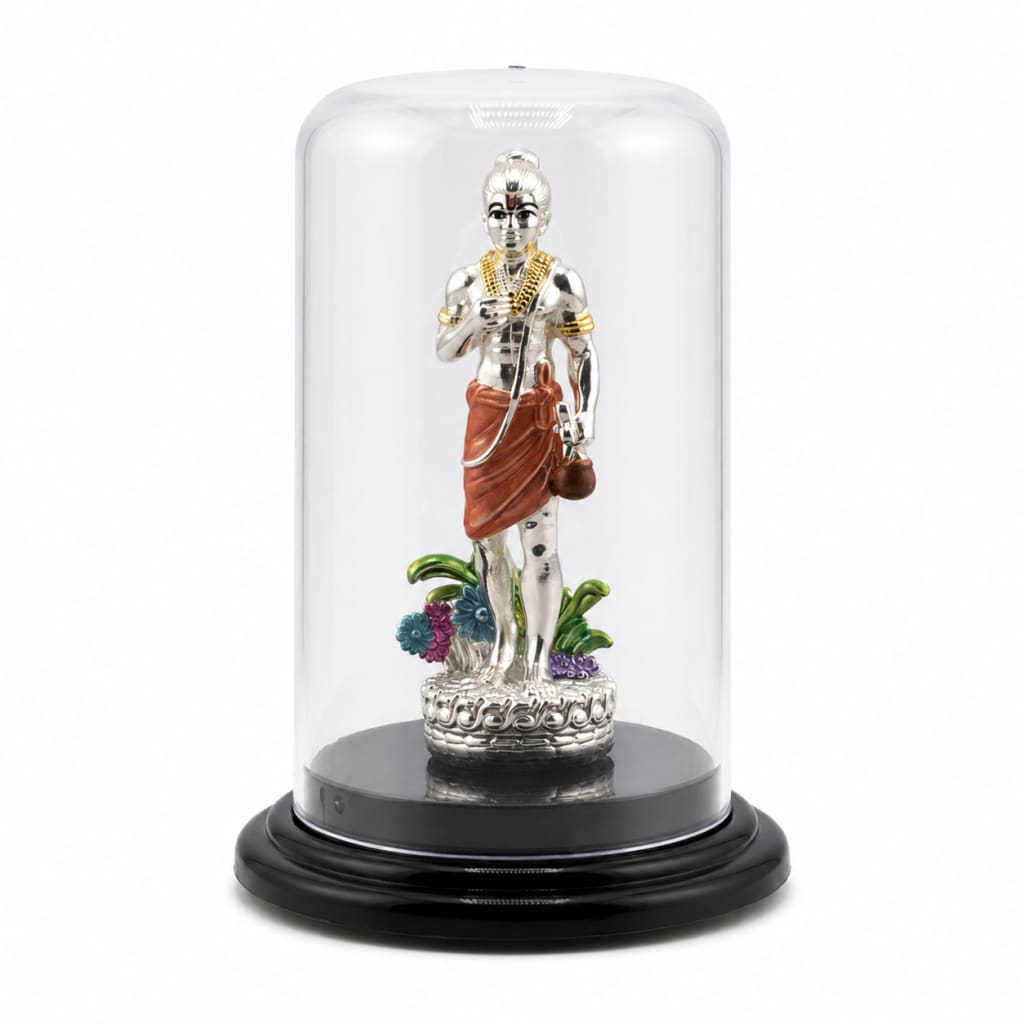 999 pure silver Swaminarayan idol in acrylic dome front view
