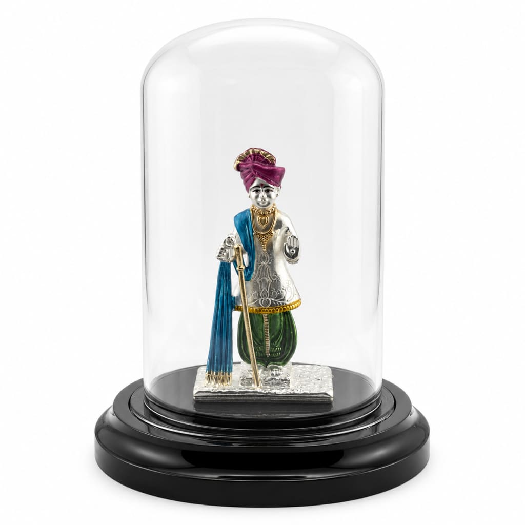 999 pure silver Swaminarayan idol in protective acrylic dome