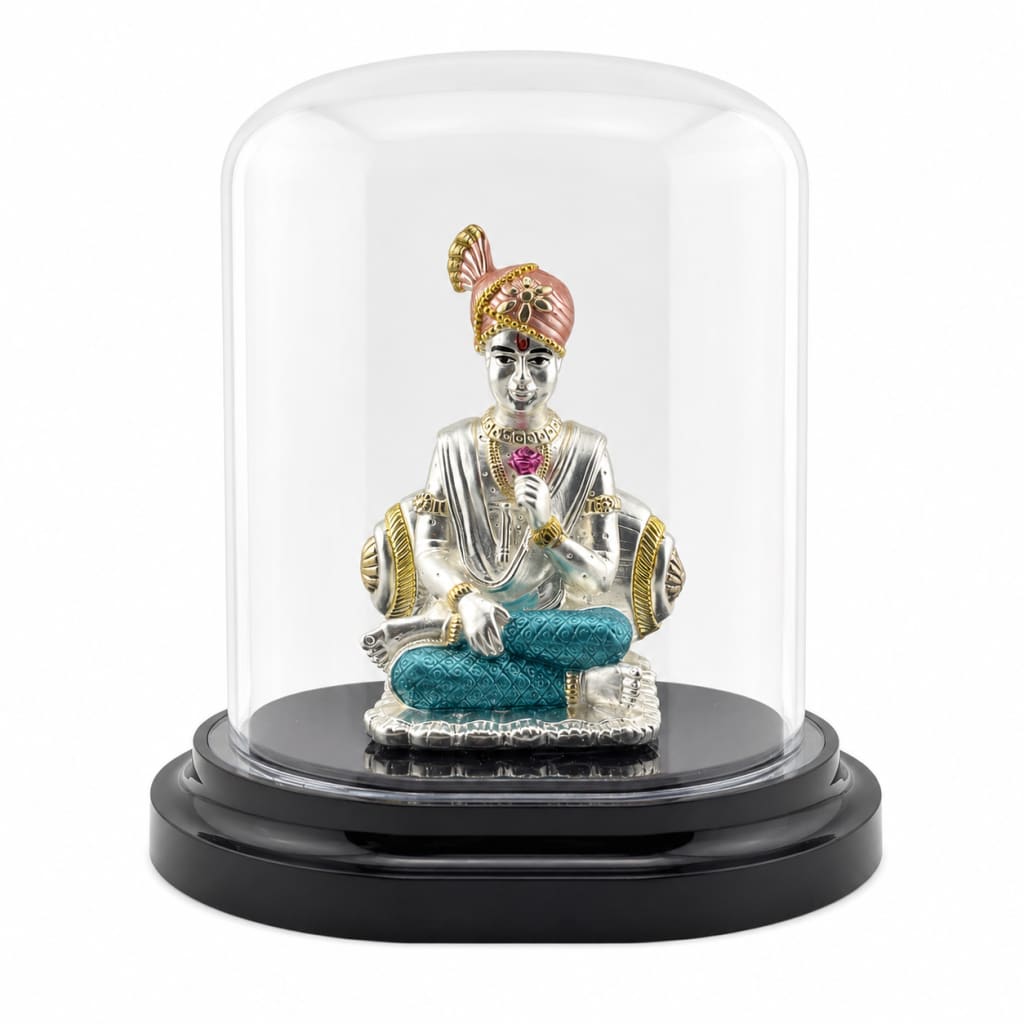 999 pure silver Swaminarayan idol in acrylic dome