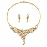 Gold-plated 925 sterling silver clear-stone leaf necklace and earrings set on white background