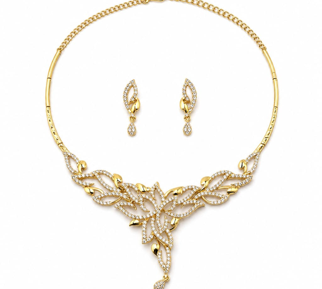 Gold-plated 925 sterling silver clear-stone leaf necklace and earrings set on white background