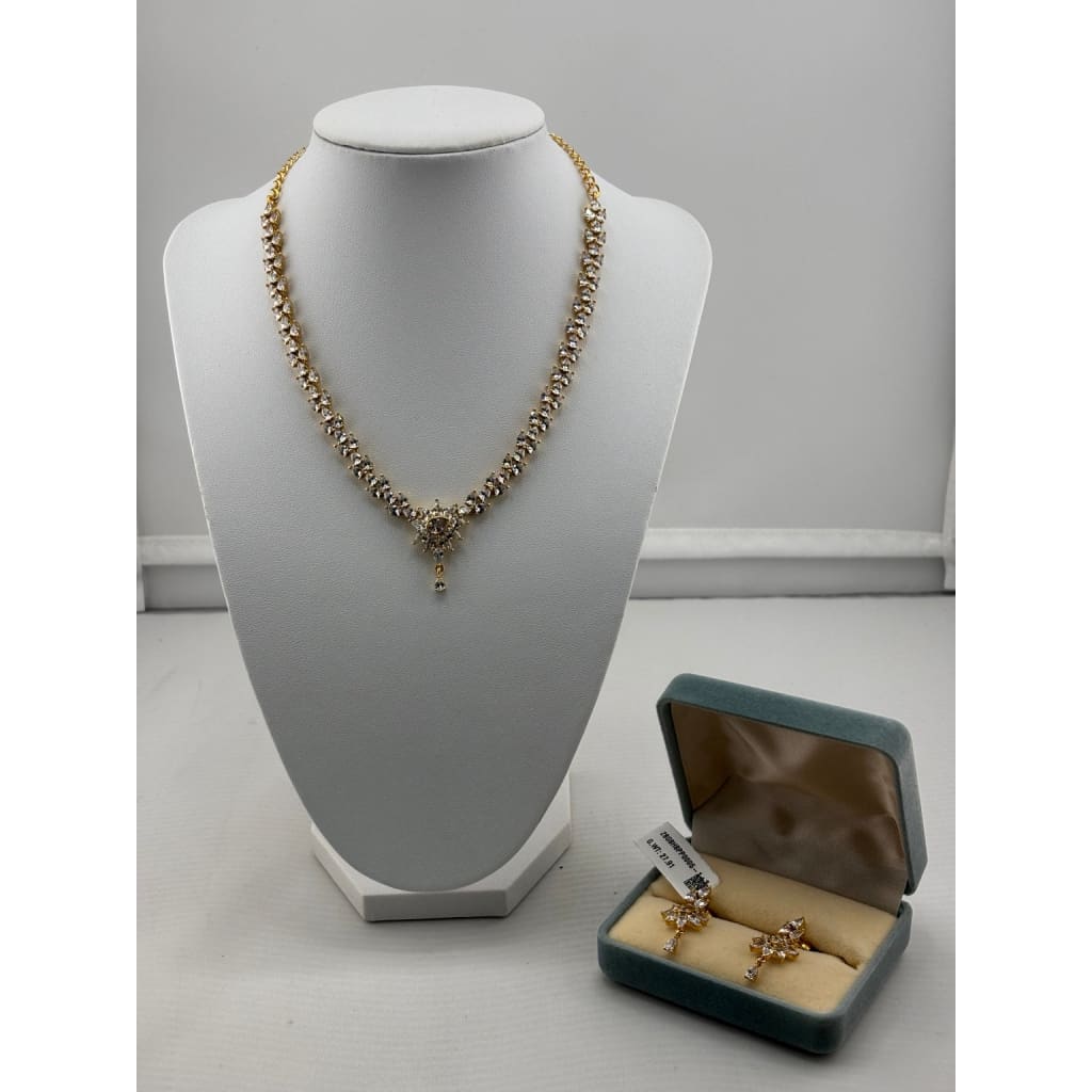 925 sterling silver gold-plated necklace set with clear stones and drop earrings