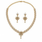 Gold-plated 925 sterling silver crystal necklace and matching earrings set on pure white background