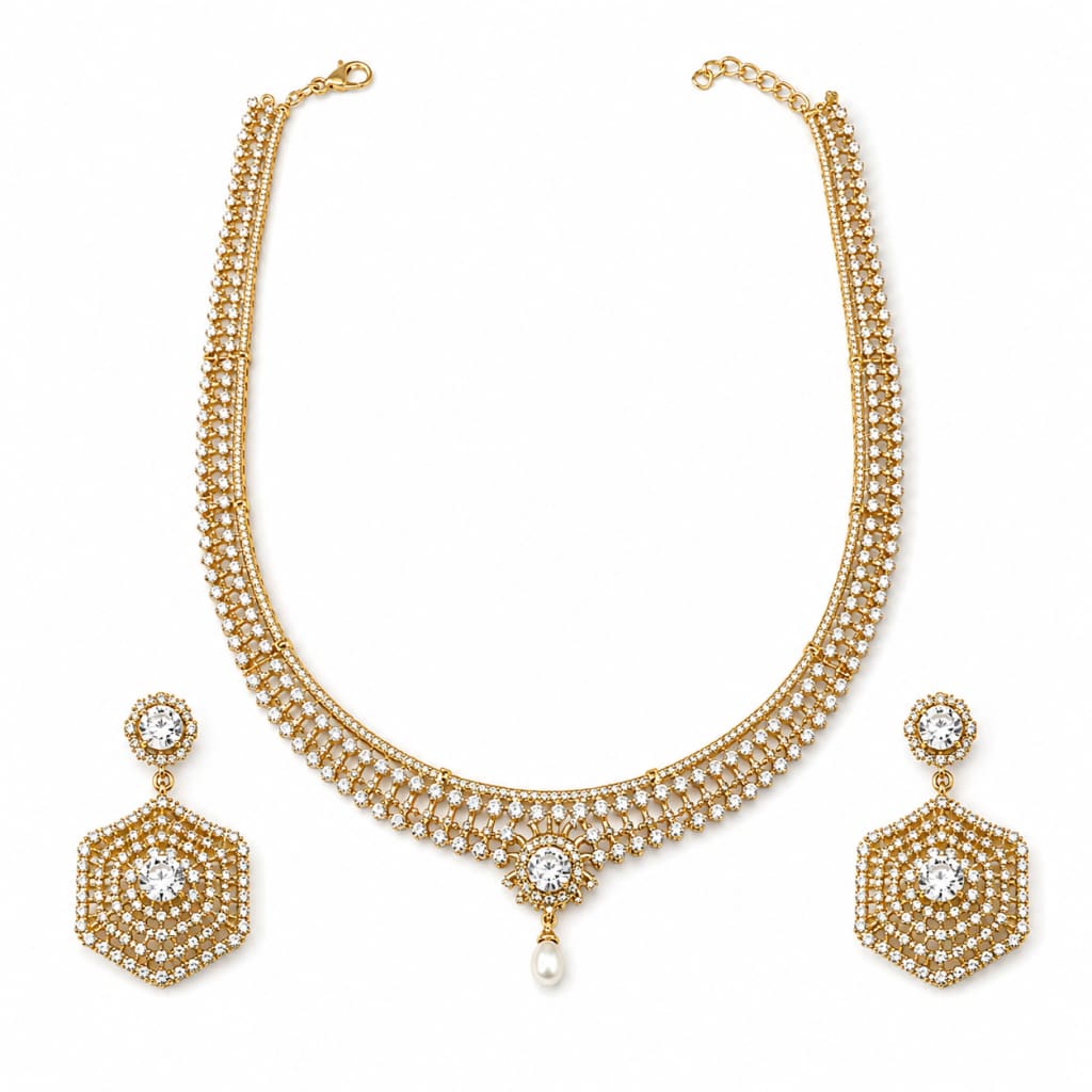 Gold-plated crystal necklace and matching hexagonal earrings set on white background
