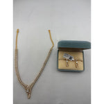 Gold-plated floral crystal necklace and matching drop earrings set