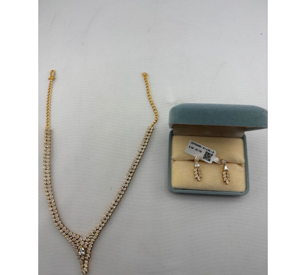 Gold-plated floral crystal necklace and matching drop earrings set