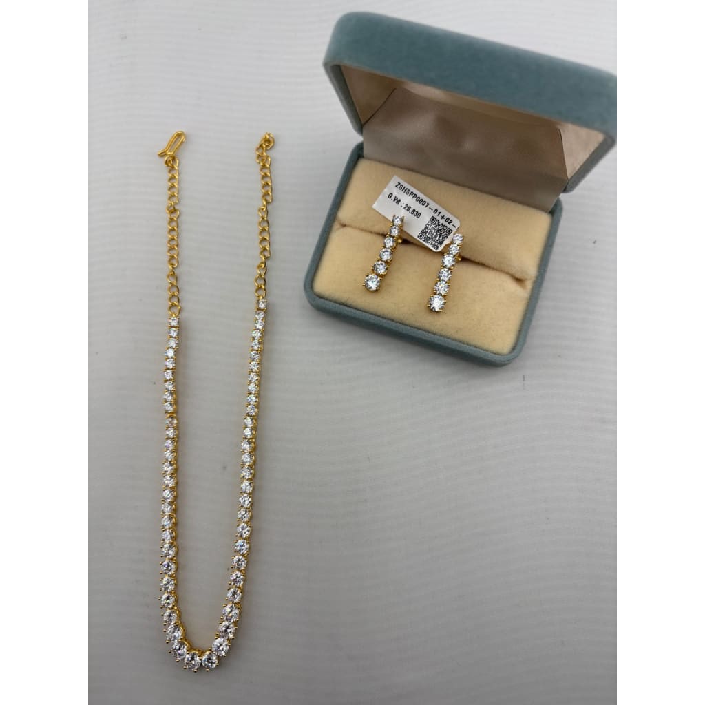 Gold-plated graduated crystal tennis necklace and matching earrings set