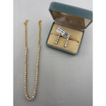 Gold-plated graduated crystal tennis necklace and matching earrings set