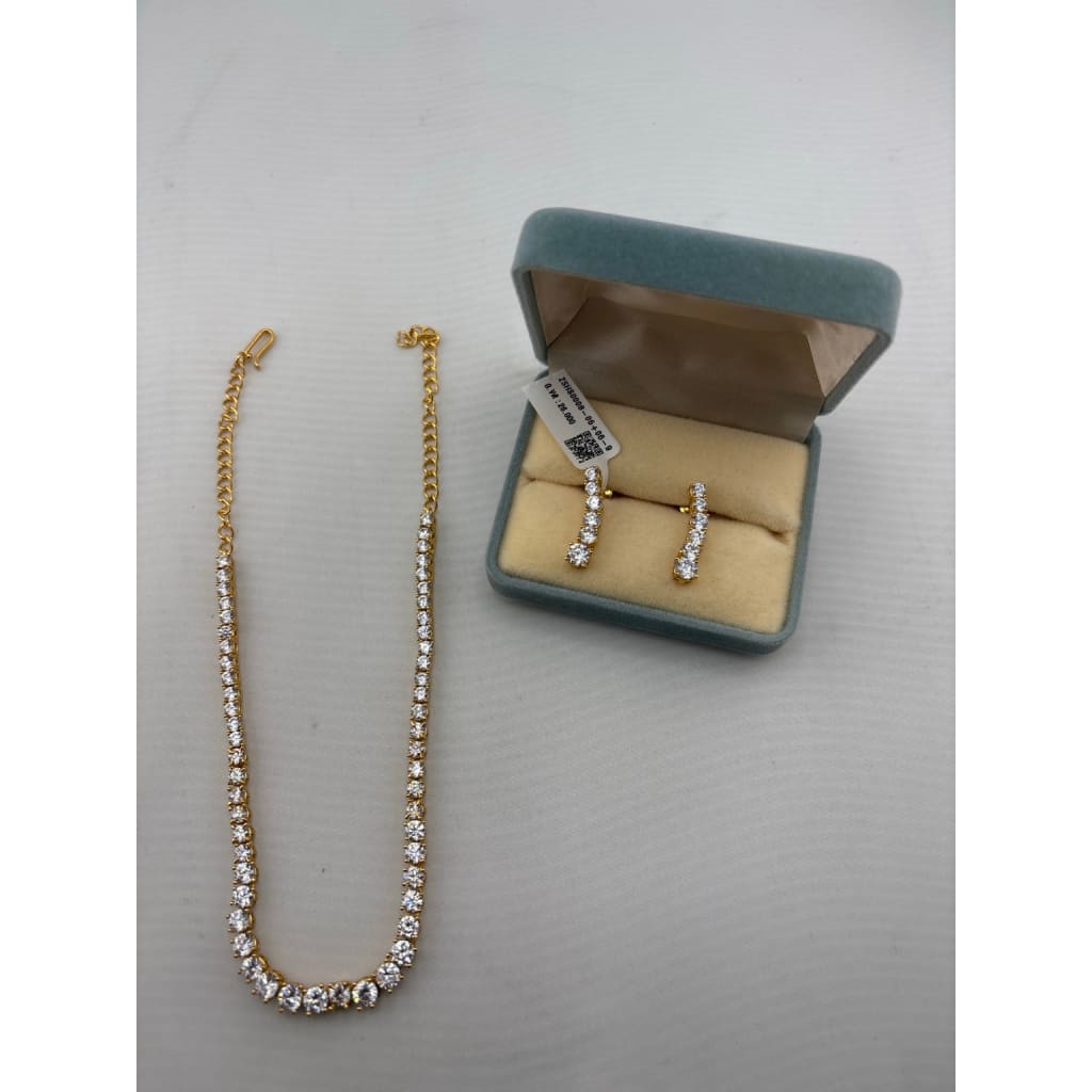 Gold-plated graduated tennis necklace with matching five-stone drop earrings