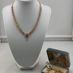 925 sterling silver gold-plated necklace set with clear stones and drop earrings